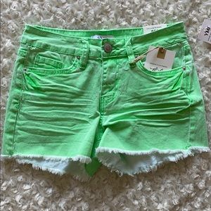 Neon green jean shorts